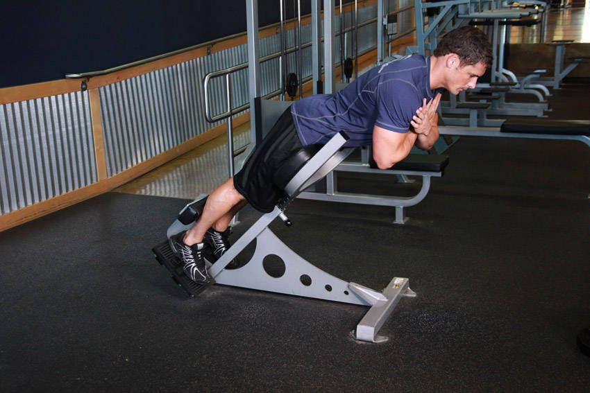 Back Extension demonstration, start of the movement, targeting the back