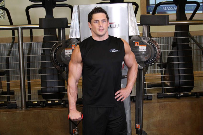 Cable Front Raise demonstration, start of the movement, targeting the shoulders