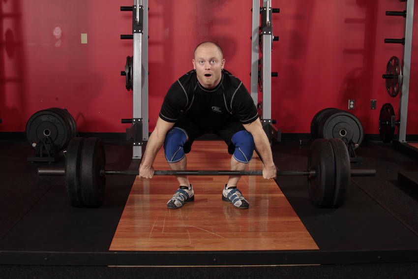 Clean demonstration, start of the movement, targeting the quads