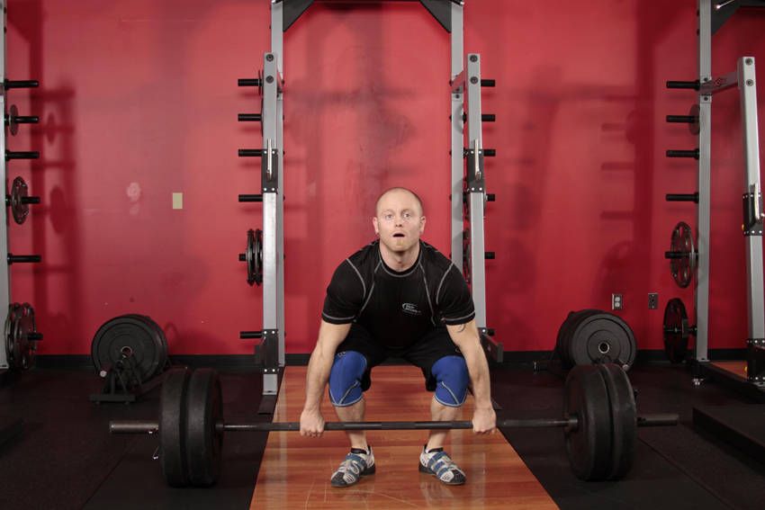 Clean Deadlift demonstration, start of the movement, targeting the hamstrings