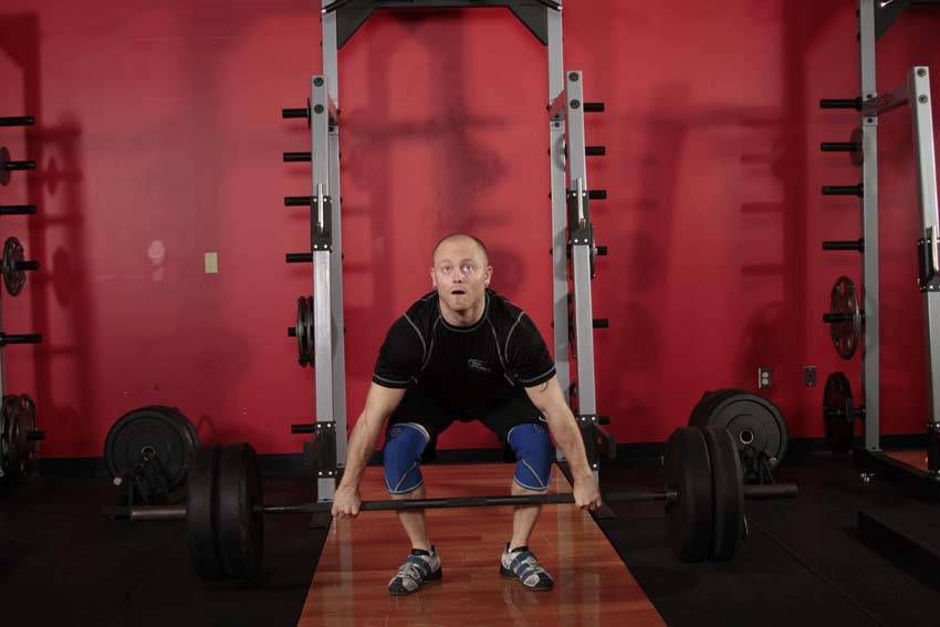 Clean Pull demonstration, start of the movement, targeting the hamstrings