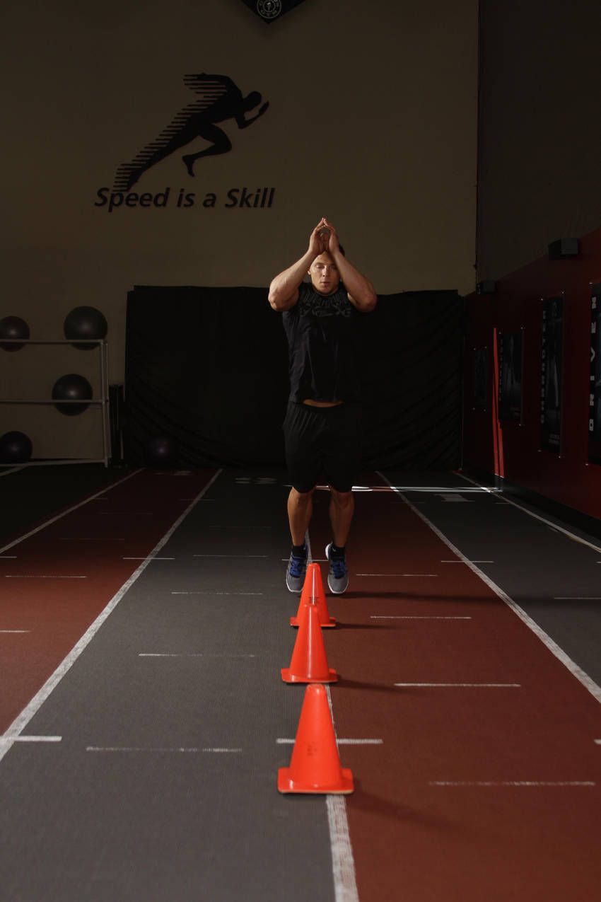 Cone Hops demonstration, start of the movement, targeting the calves