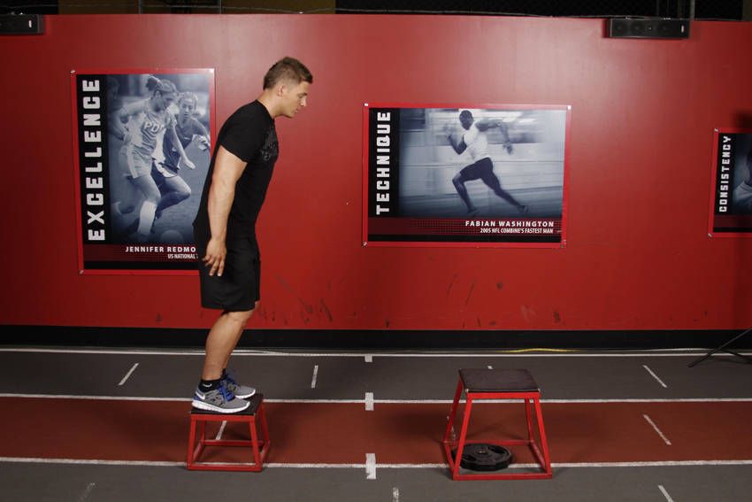 Depth Jump demonstration, start of the movement, targeting the quads