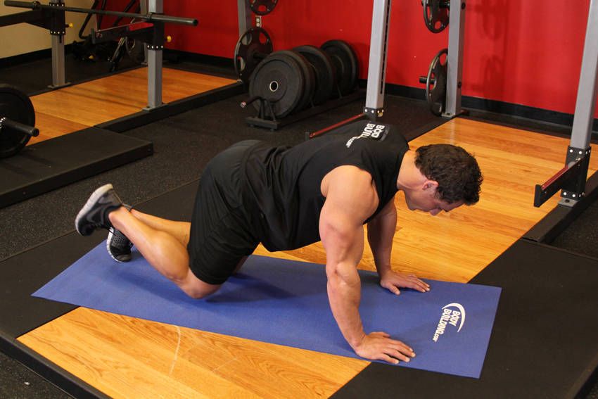 Glute Kickback Machine demonstration, start of the movement, targeting the glutes