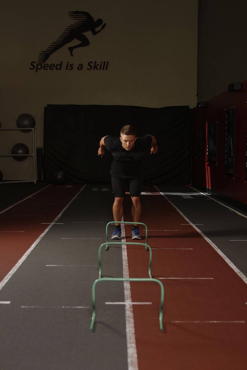 Hurdle Hops demonstration, start of the movement, targeting the calves