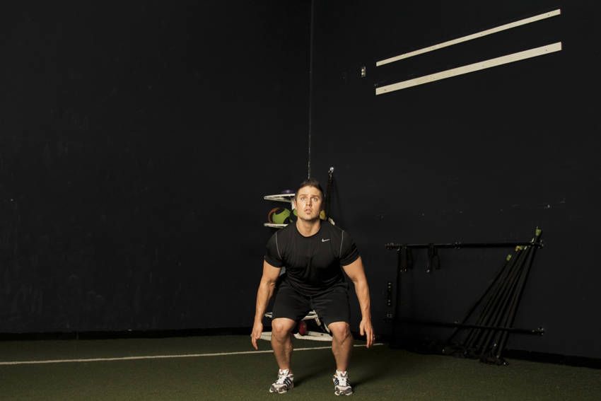Jump Squat demonstration, start of the movement, targeting the quads