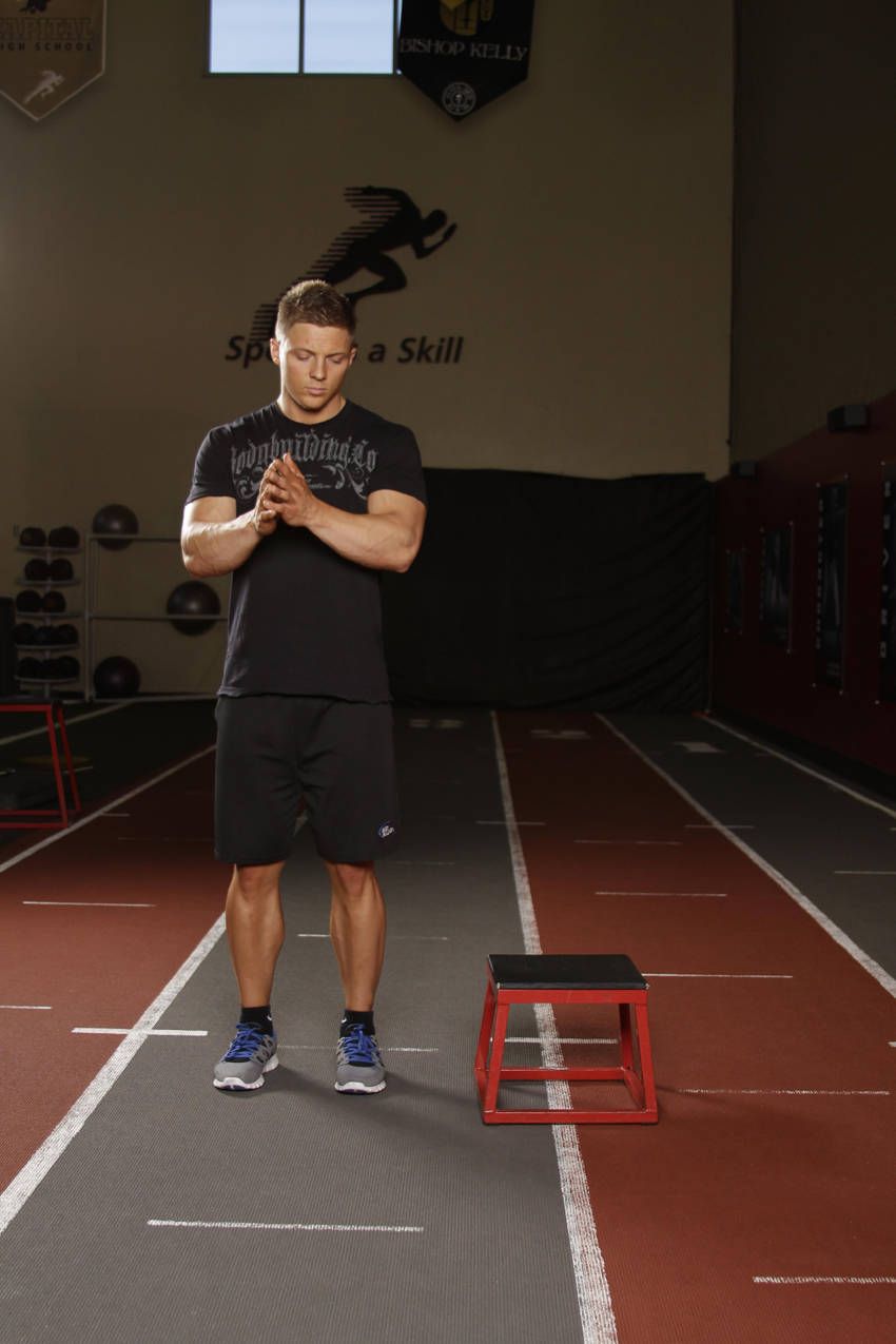 Lateral Box Jump demonstration, start of the movement, targeting the glutes