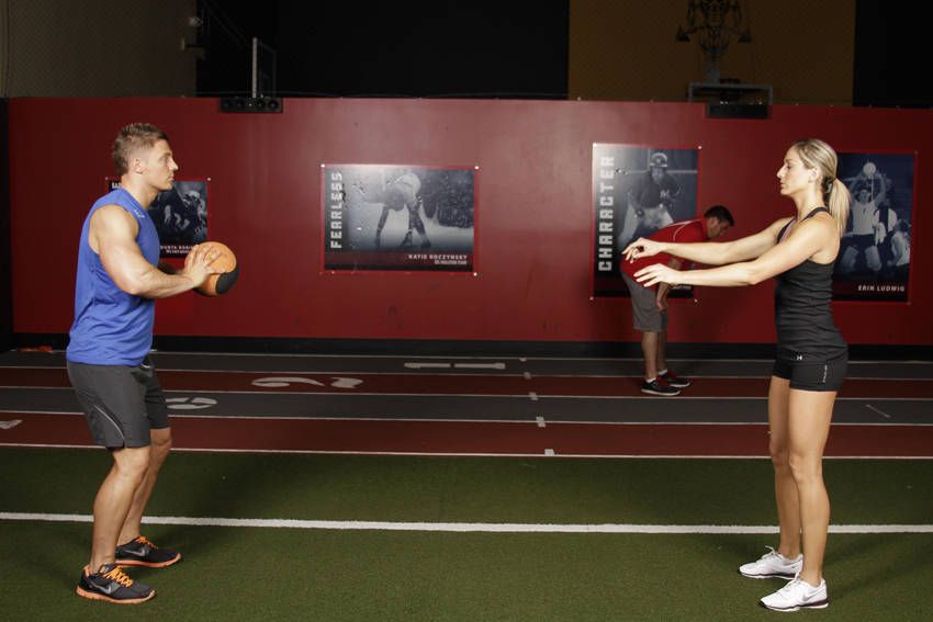 Medicine Ball Chest Pass demonstration, start of the movement, targeting the chest