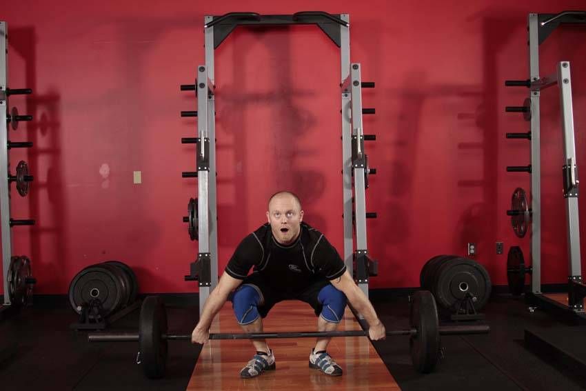 Power Snatch demonstration, start of the movement, targeting the quads