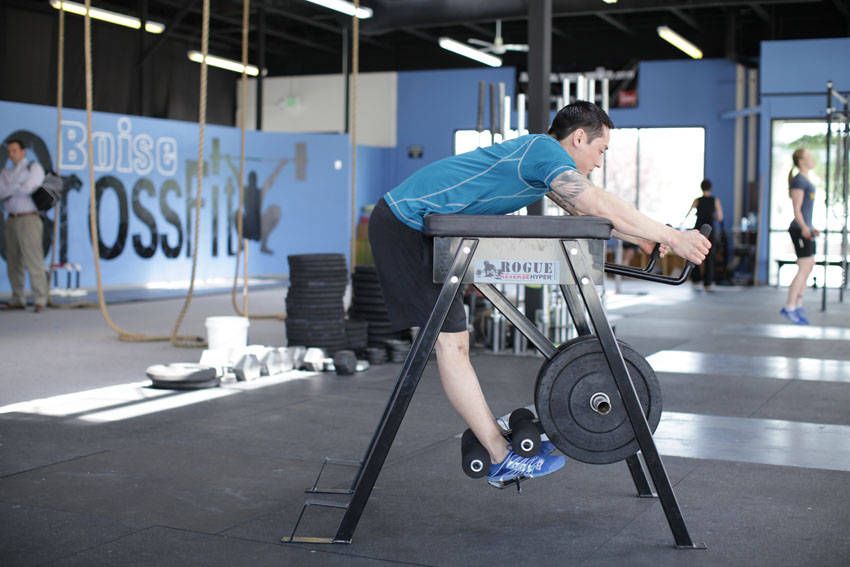 Reverse Hyperextension demonstration, start of the movement, targeting the glutes
