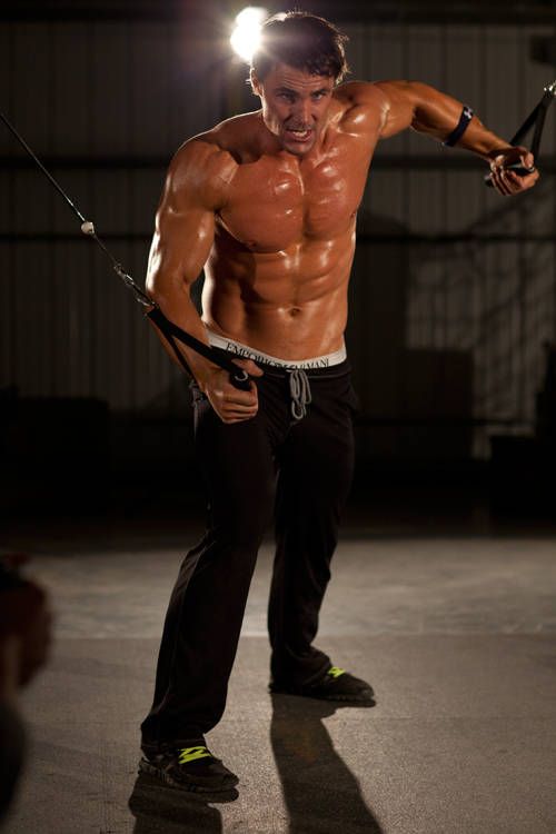 Single-Arm Cable Fly demonstration, start of the movement, targeting the chest