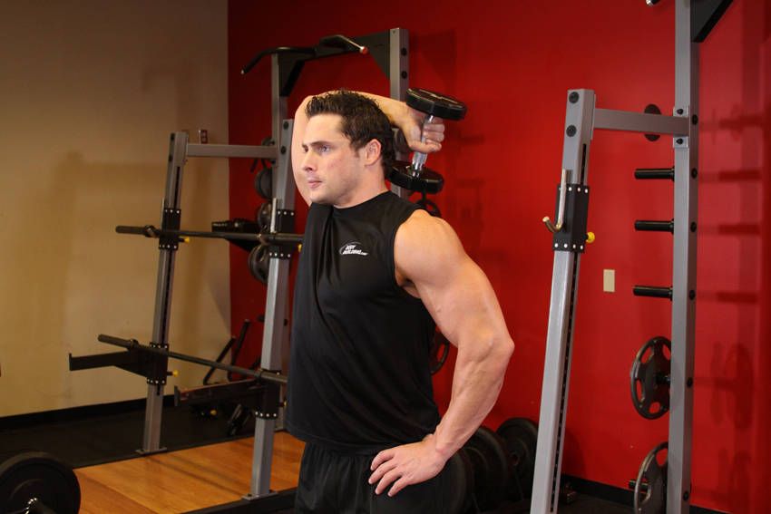 Single-Arm Overhead Dumbbell Extension demonstration, start of the movement, targeting the triceps