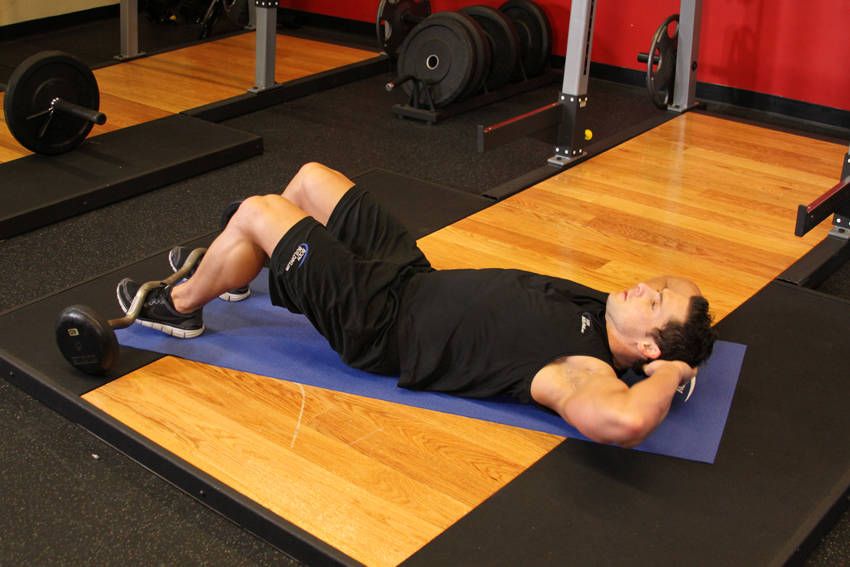 Sit-Up demonstration, start of the movement, targeting the abs