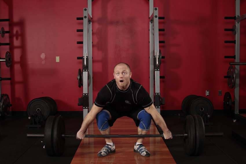 Snatch Deadlift demonstration, start of the movement, targeting the hamstrings