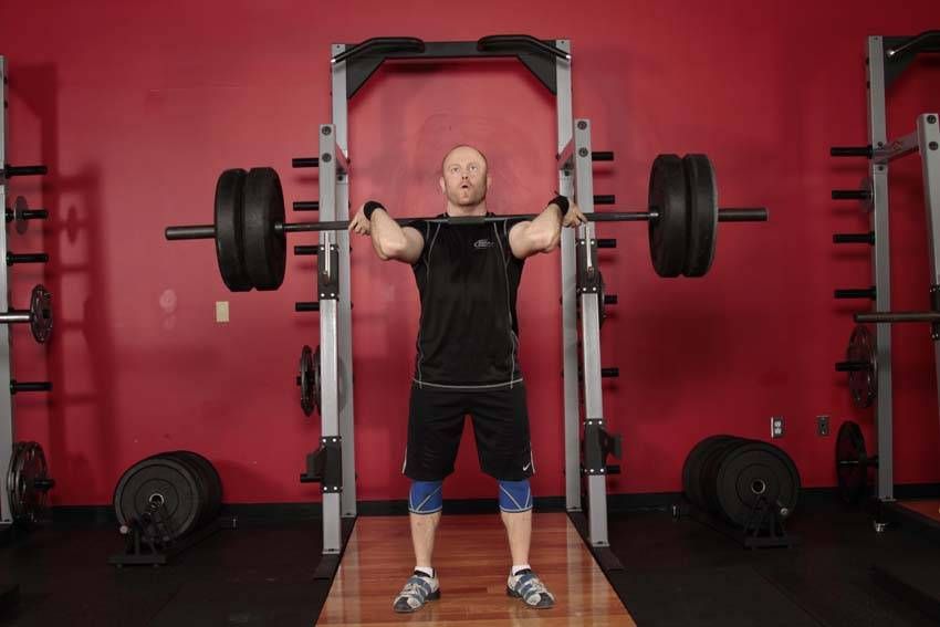 Split Jerk demonstration, start of the movement, targeting the shoulders