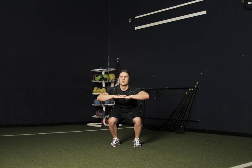 Tuck Jump demonstration, start of the movement, targeting the quads