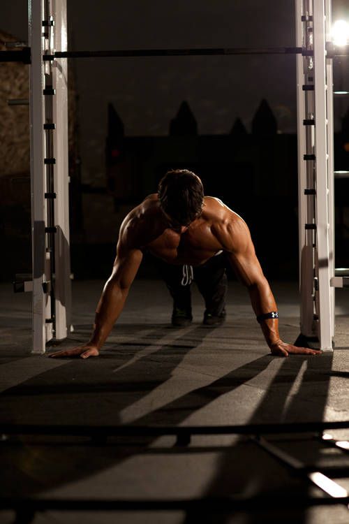 Wide-Grip Push-Up demonstration, start of the movement, targeting the chest